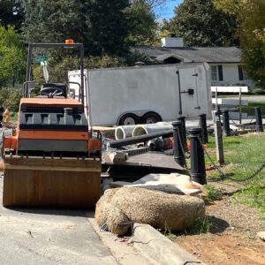 Easement construction in a residential neighborhood on a circular driveway.