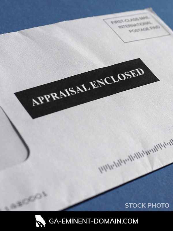 A letter with "appraisal enclosed" stamped on the front.